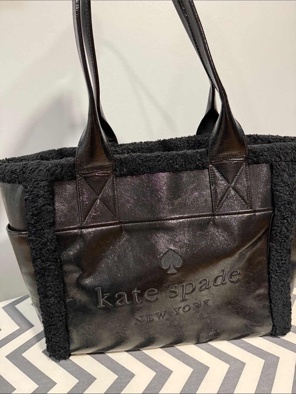kate spade black  tote with shearling trim